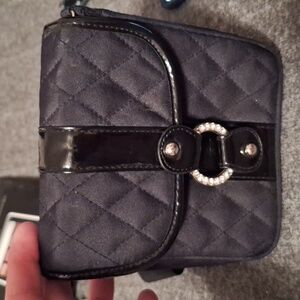 Paris Hilton Purse Looks New.